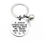 A Sister is God's Way of Making Sure We Never Walk Alone Keychain