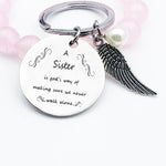 A Sister is God's Way of Making Sure We Never Walk Alone Keychain