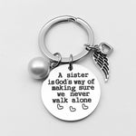 A Sister is God's Way of Making Sure We Never Walk Alone Keychain